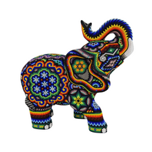 Cargar imagen en el visor de la galería, Elefante tallado en madera decorado con motivos Wixáricas