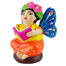 Cargar imagen en el visor de la galería, Muñequita mariposa lectora hecha de barro policromado frío