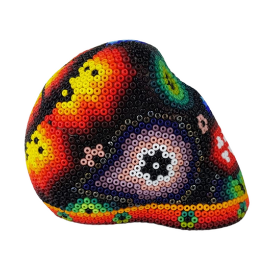 Cráneo mini decorado con motivos Wixárica