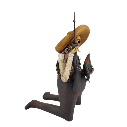 Catrín panzón, figura decorativa de barro elaborada en Capula