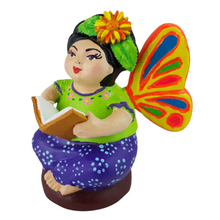 Cargar imagen en el visor de la galería, Muñequita mariposa lectora hecha de barro policromado frío