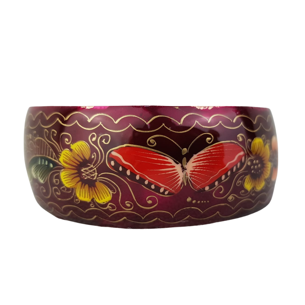 Brazalete ancho de cobre decorado con mariposas y flores