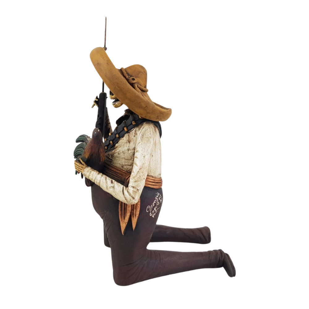 Catrín panzón, figura decorativa de barro elaborada en Capula