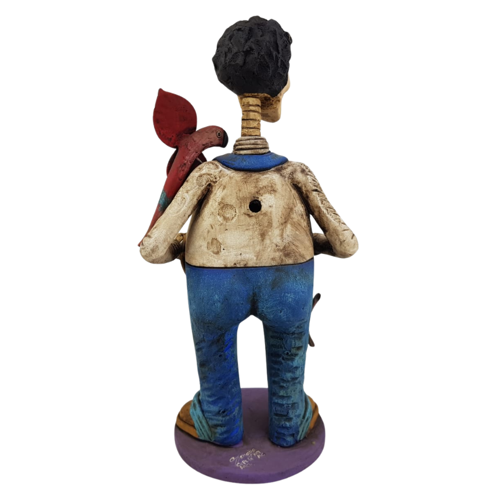 Catrín panzón, figura decorativa de barro elaborada en Capula