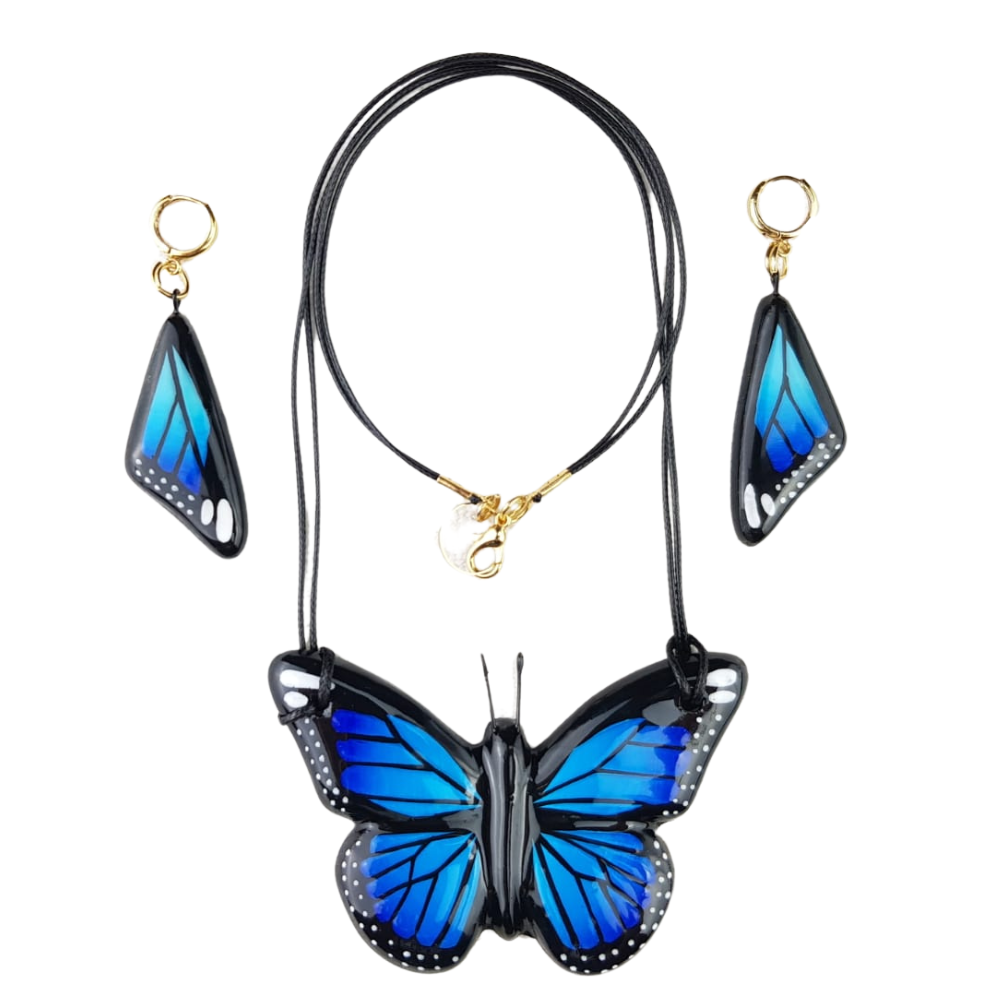 Juego de bisutería de barro policromado con forma de mariposa monarca, y azul