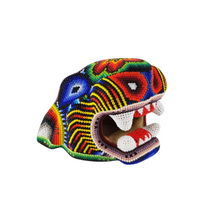 Cargar imagen en el visor de la galería, Cabeza de jaguar hecha de madera tallada a mano y decorada con motivos wixárika
