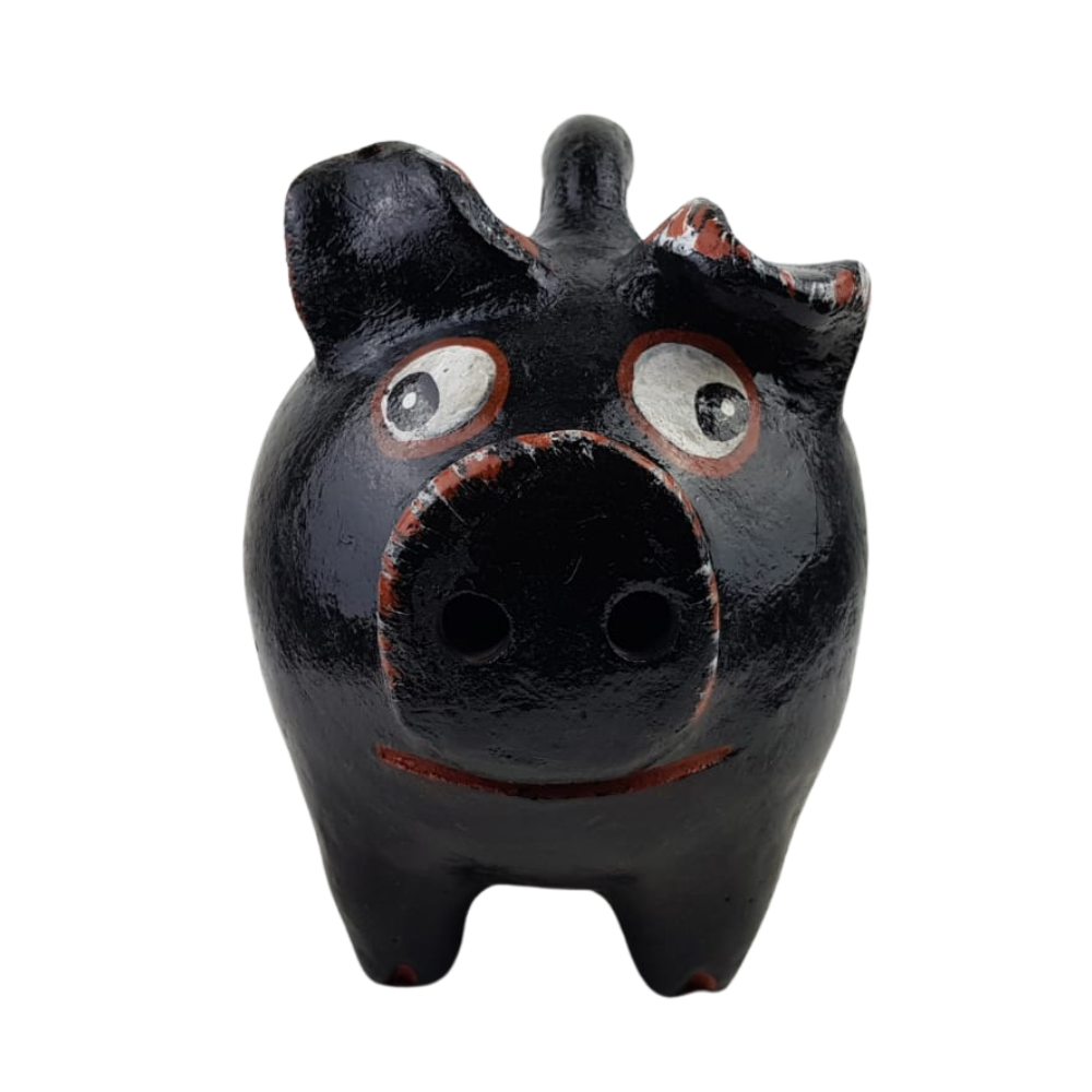 Alcancía con forma de cerdito bola hecho de barro natural