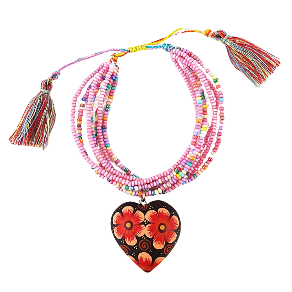 Pulsera con corazón o trompo de madera copal tallado y decorado a mano