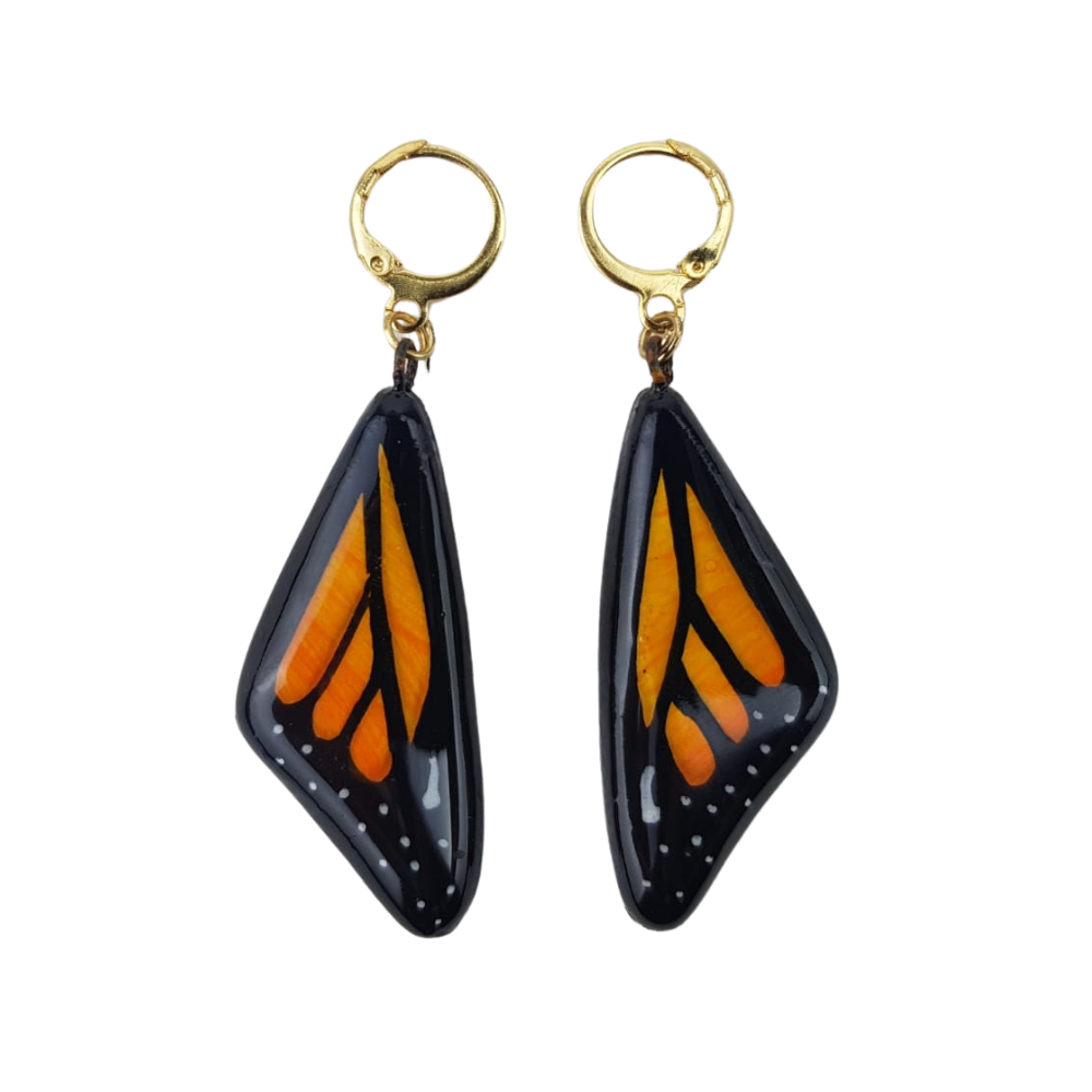 Juego de bisutería de barro policromado con forma de mariposa monarca, y azul