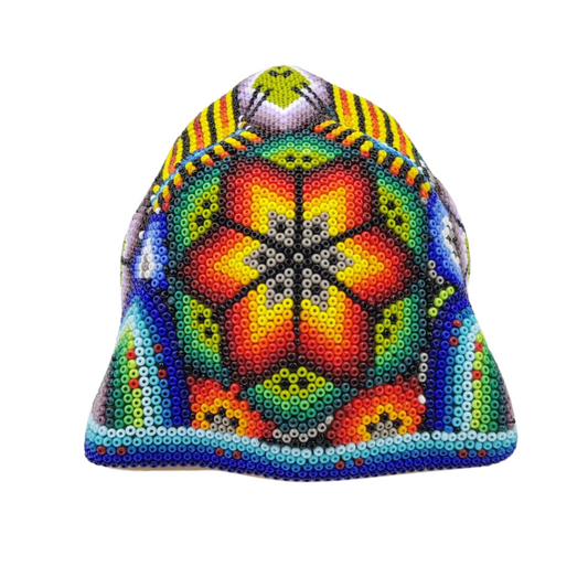 Cabeza de jaguar mediana hecha de papel maché con motivos wixárika