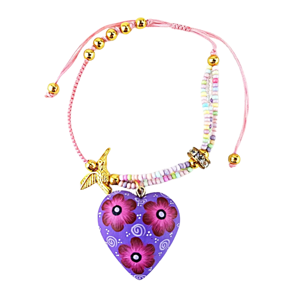 Pulsera con corazón o trompo de madera copal tallado y decorado a mano