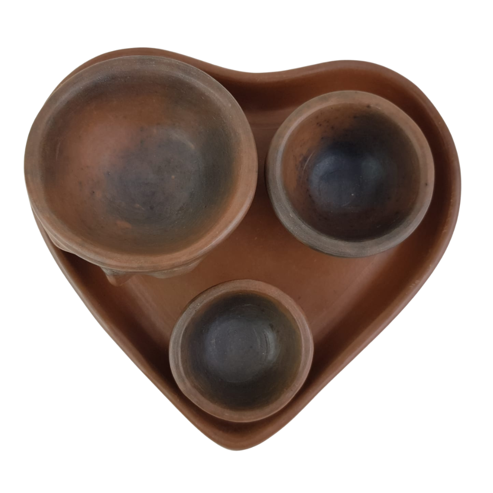 Juego mezcalero con plato de corazón