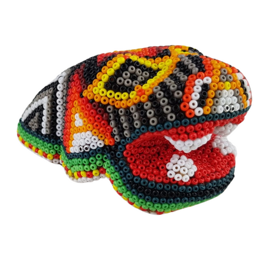 Cabeza de jaguar mini hecha de papel maché con motivos Wixárika