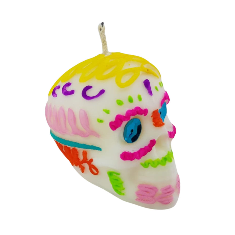 Vela para día de muertos, con forma de calaverita, flor de cempasúchil o papel picado