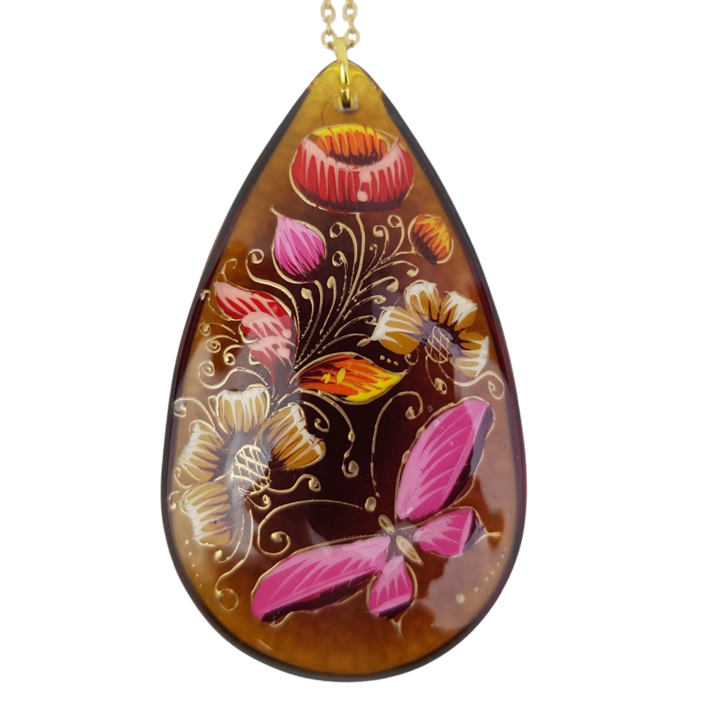 Dije de gota grande de cristal decorado con flores y mariposas
