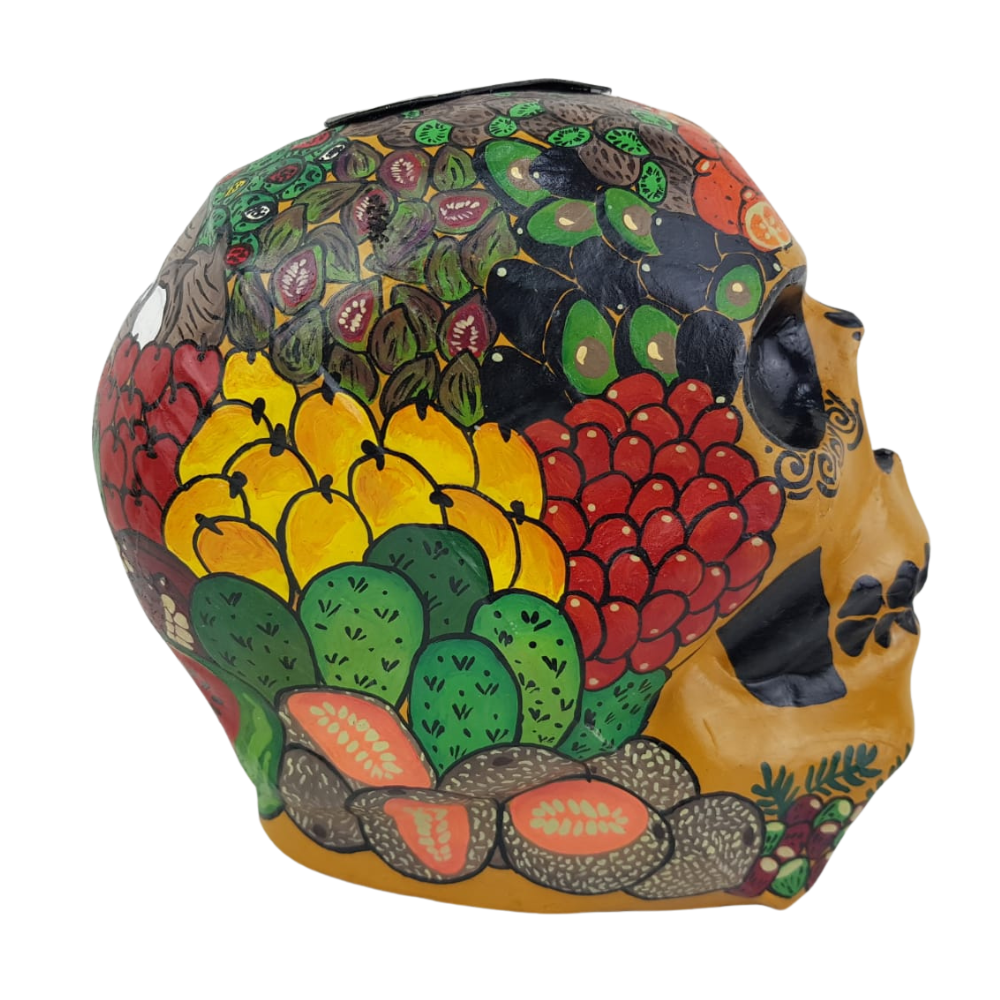 Alcancía con forma de cráneo elaborada con papel maché