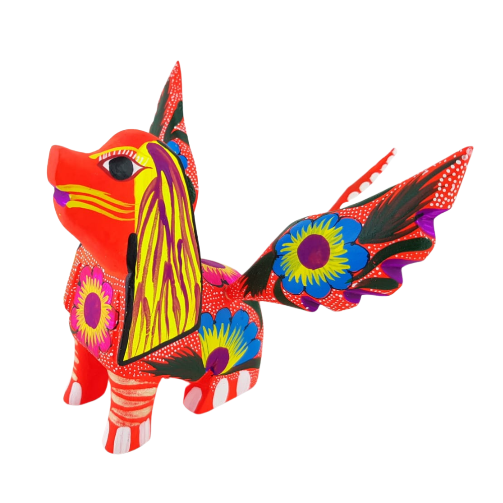 Alebrije oaxaqueño mediano, con forma de perro con alas, de madera de copal