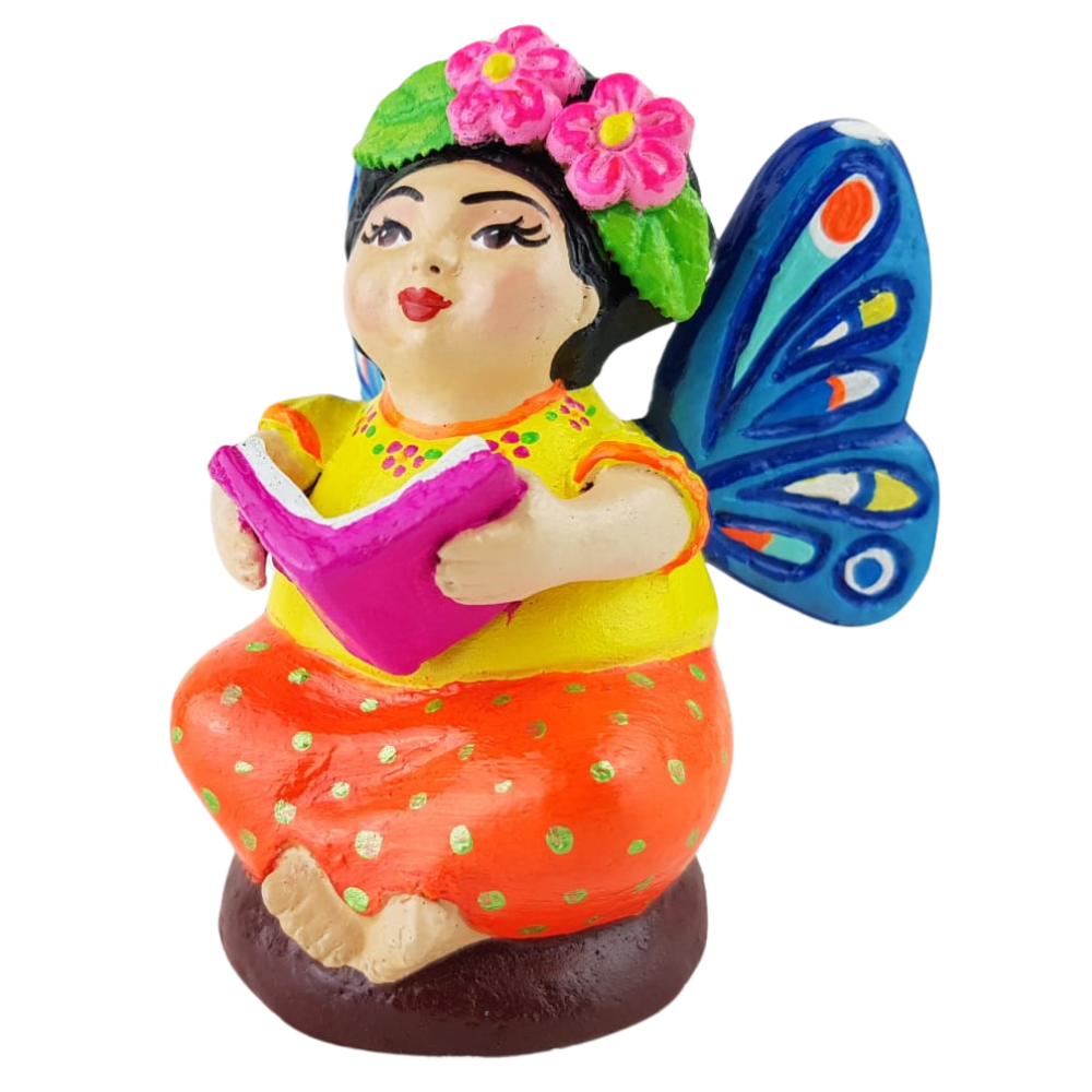 Muñequita mariposa lectora hecha de barro policromado frío