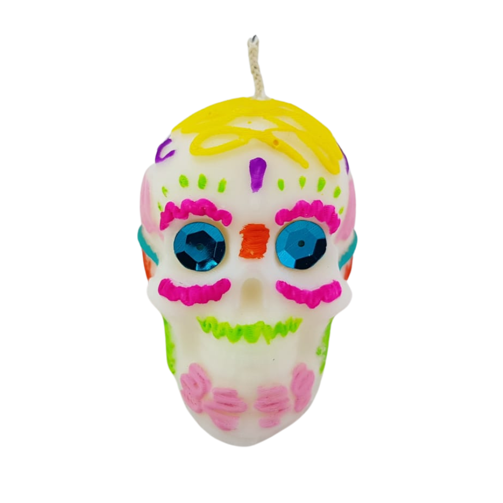 Vela para día de muertos, con forma de calaverita, flor de cempasúchil o papel picado
