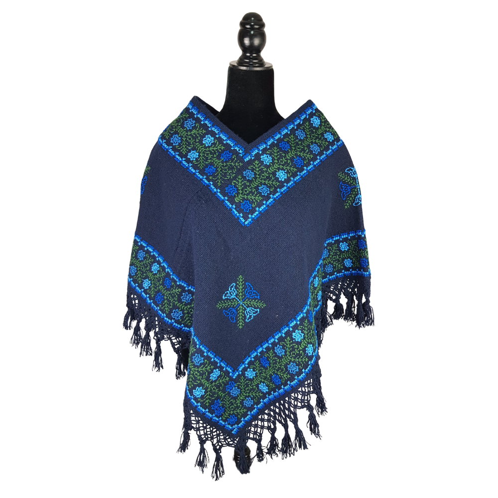 Quexquémetl, capita mediana de acrilán con bordado en punto de cruz o puntada antigua