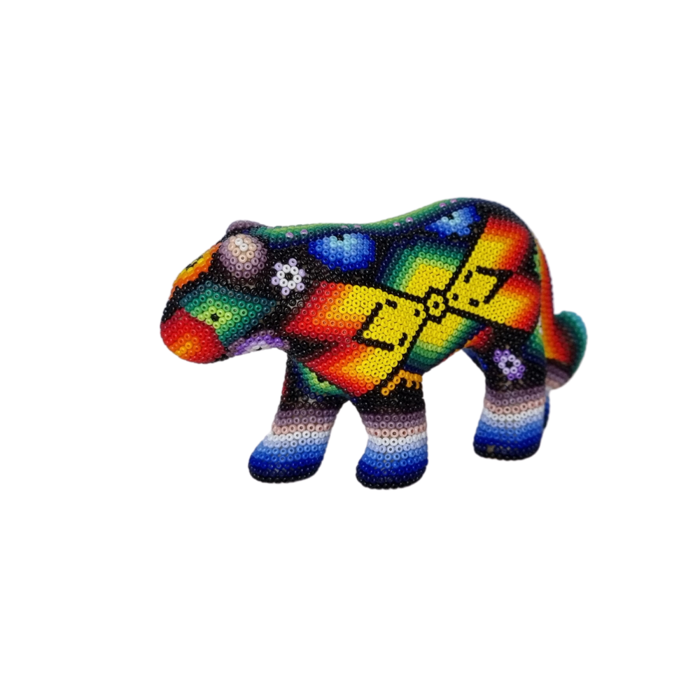 Pantera decorada con motivos Wixárika