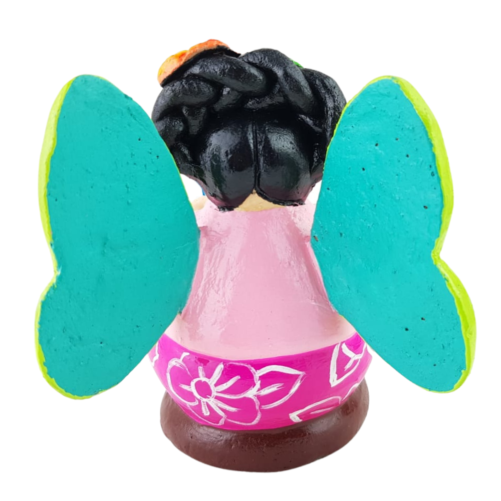 Muñequita mariposa lectora hecha de barro policromado frío