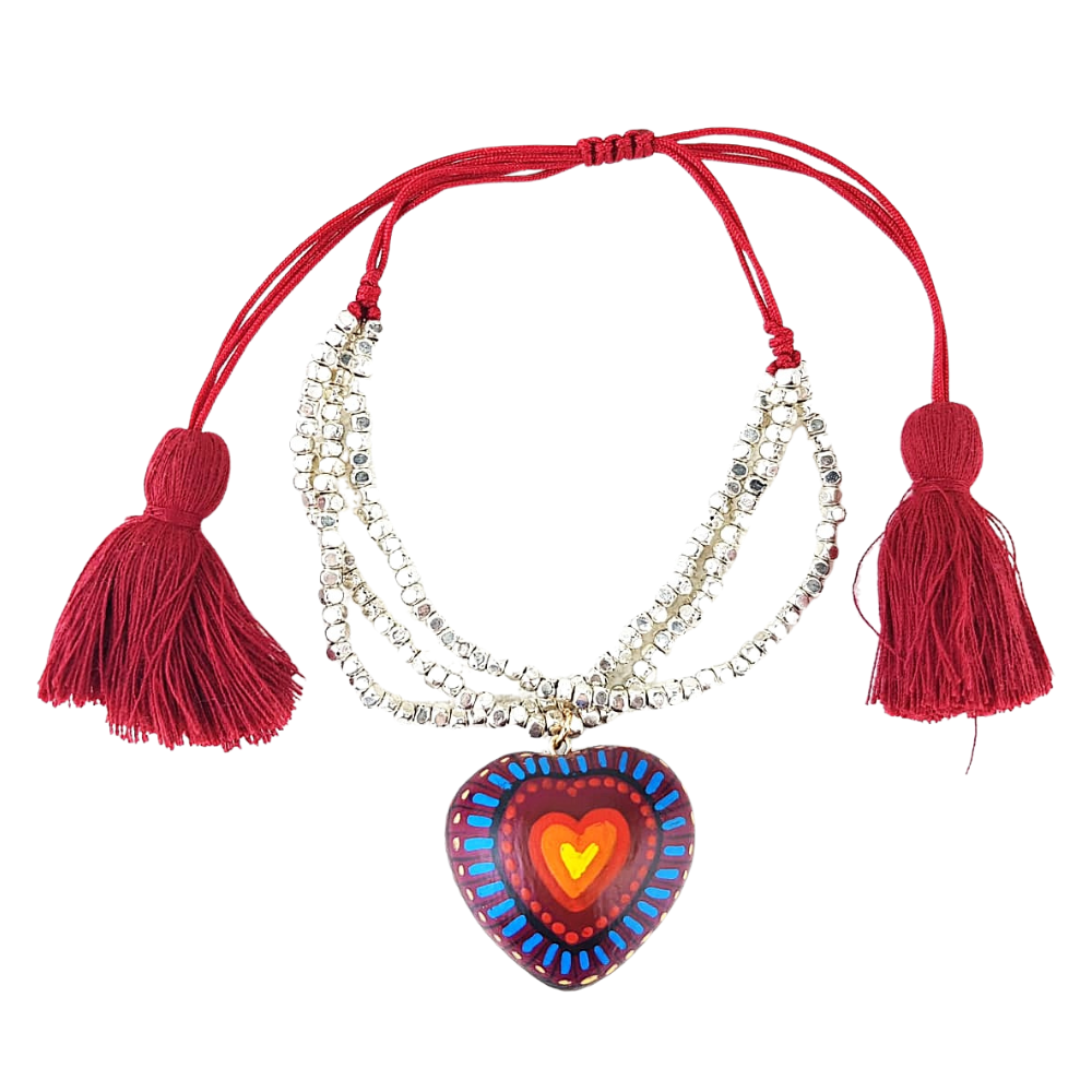 Pulsera con corazón o trompo de madera copal tallado y decorado a mano