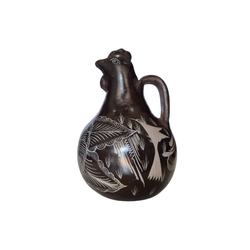 Jarra mini con forma de animalito de barro bruñido decorado con flores y pájaros