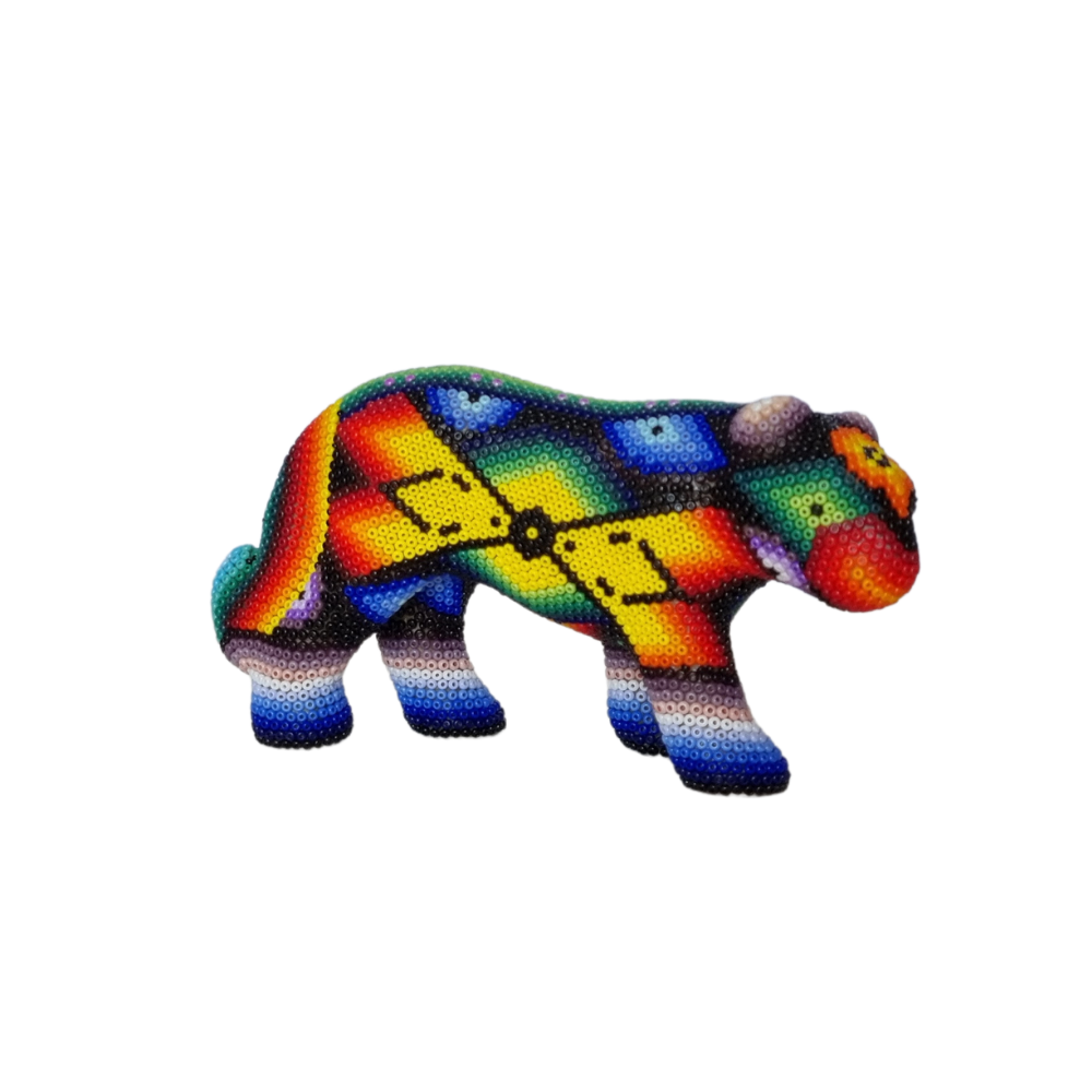 Pantera decorada con motivos Wixárika