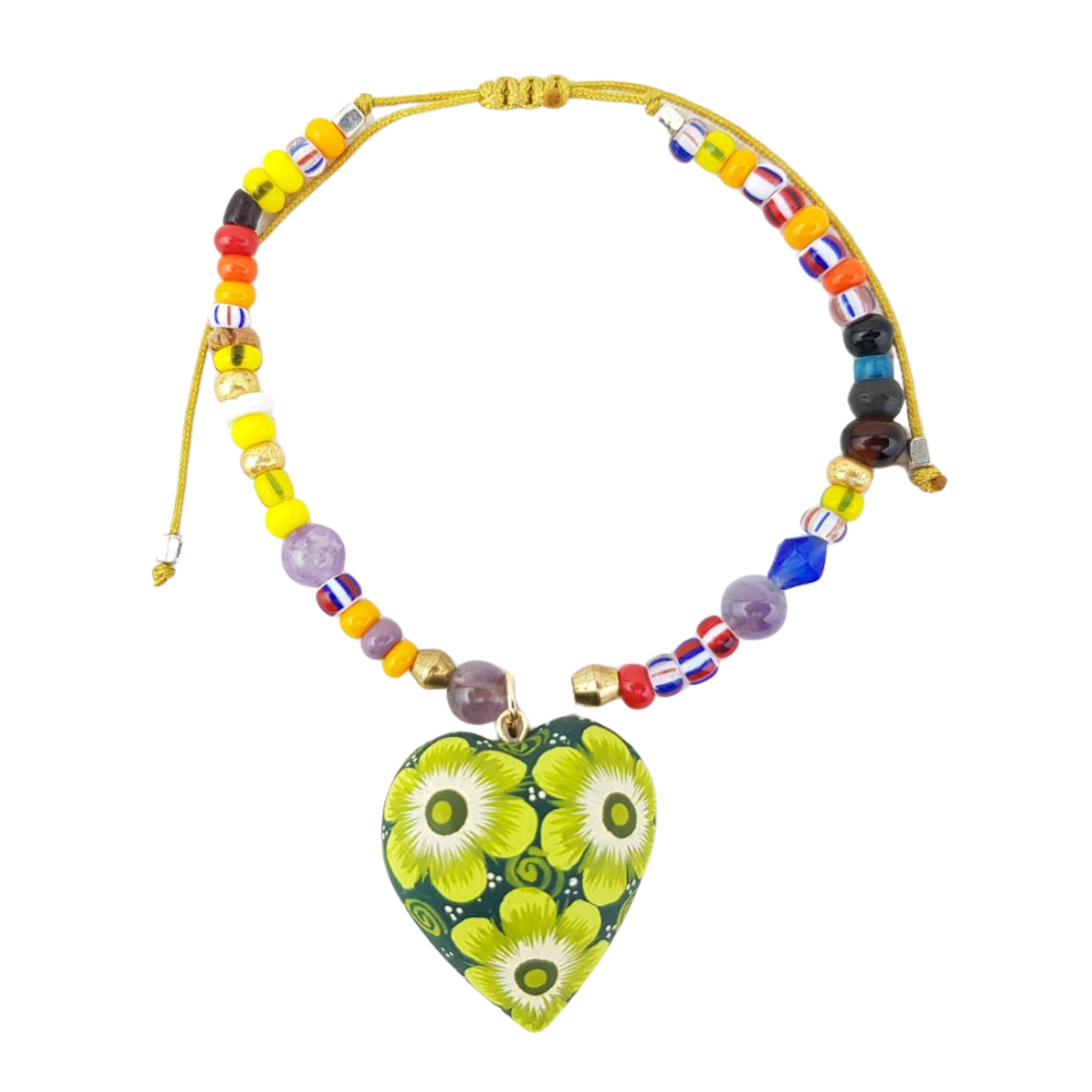 Pulsera con corazón o trompo de madera copal tallado y decorado a mano