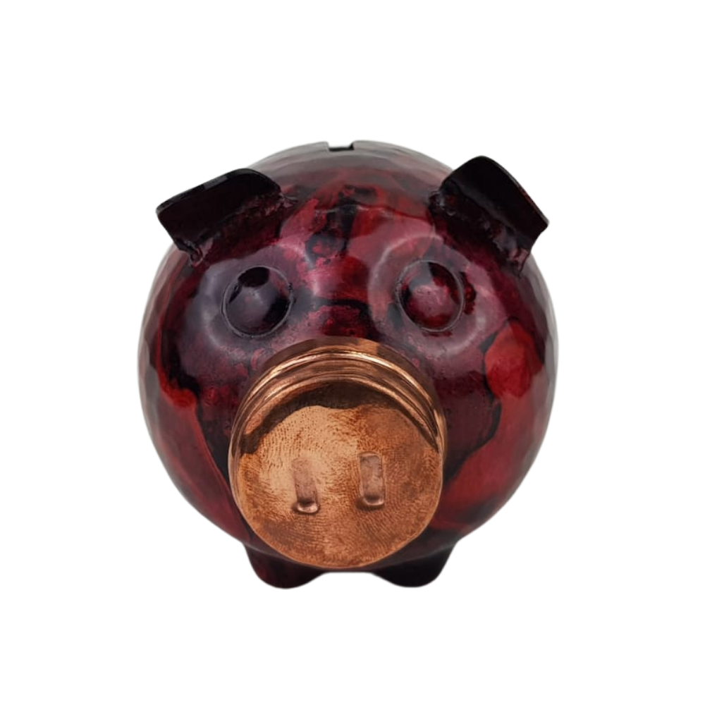 Alcancía de cobre en forma de puerquito decorada a mano