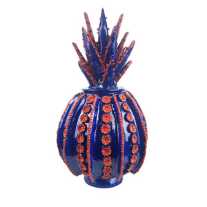Piña bombonera decorada con la técnica de barro vidriado