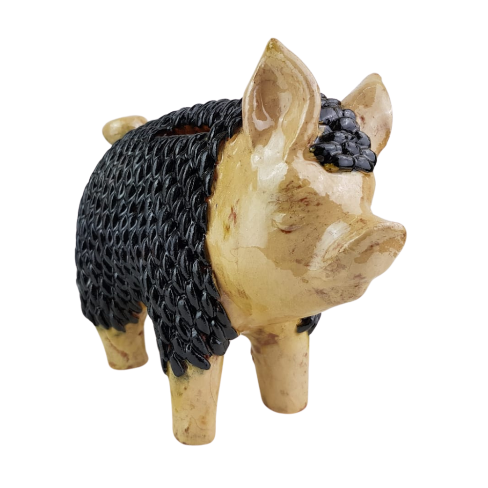 Alcancía en forma cerdito elaborada a mano con la técnica de barro vidriado