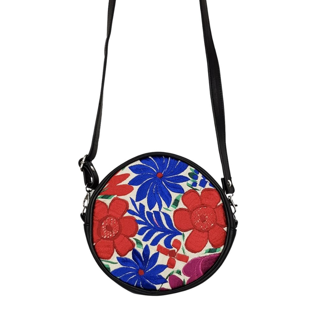 Bolsa redonda de piel con textil artesanal