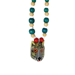 Collar de máscara miniatura del baile de los Morenos, tallada y decorada a mano