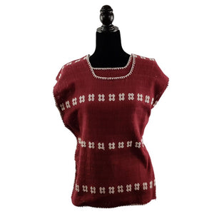 Blusa mixteca de telar de cintura, textura calada decorada con brocados mariposa