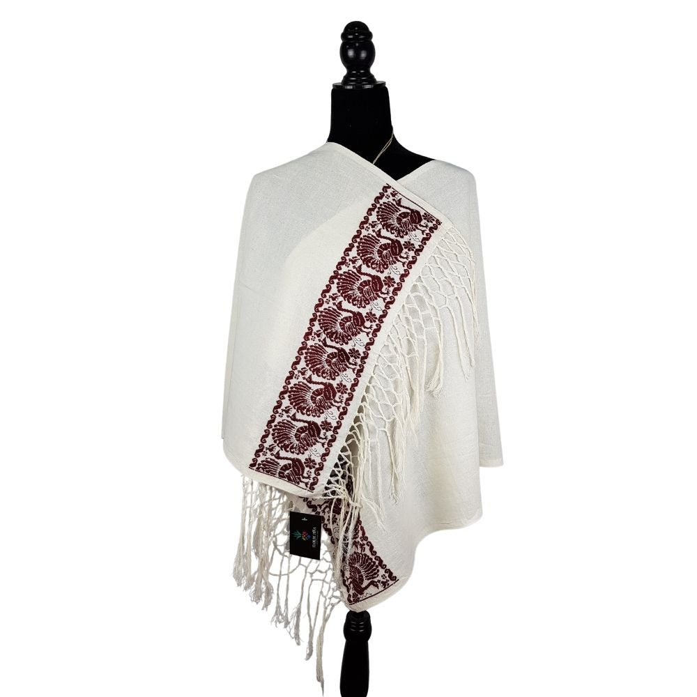 Rebozo de manta con bordado hilván