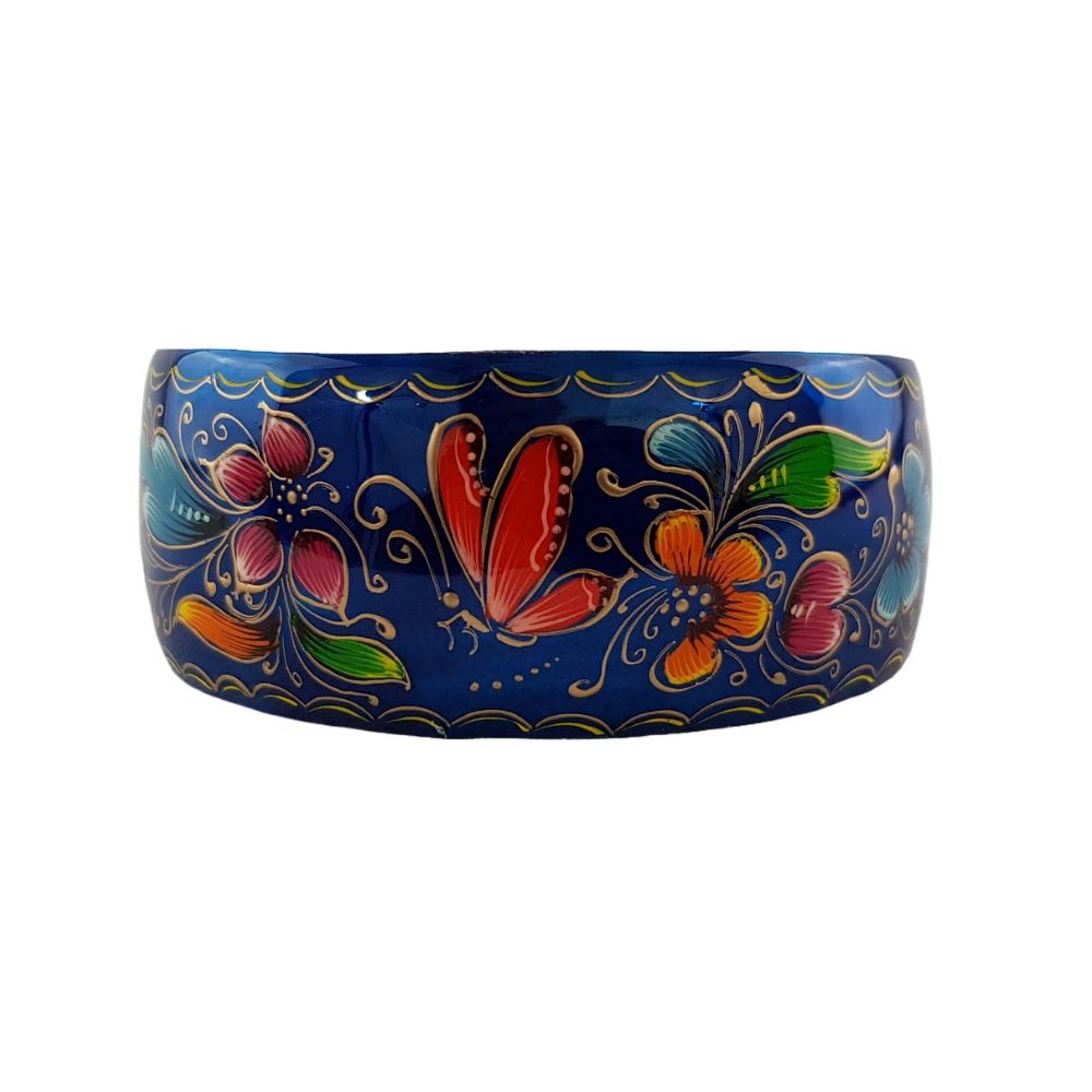 Brazalete ancho de cobre decorado con mariposas y flores