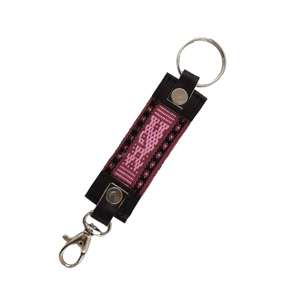 Llavero de piel con textil decorado con motivos Oaxaqueños