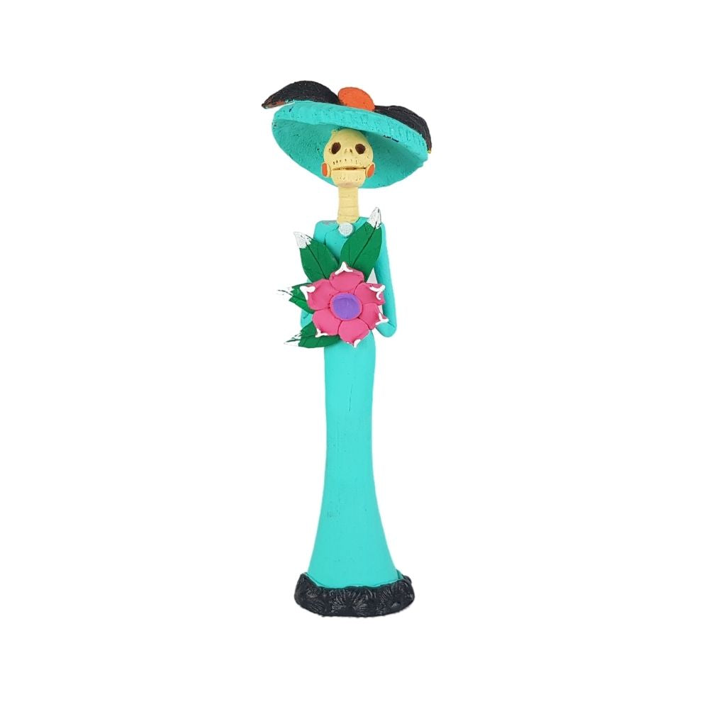 Catrina con flores, figura decorativa de barro elaborada en Capula