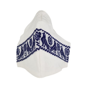 Cubrebocas manta con bordado de hilván tradicional de Puebla