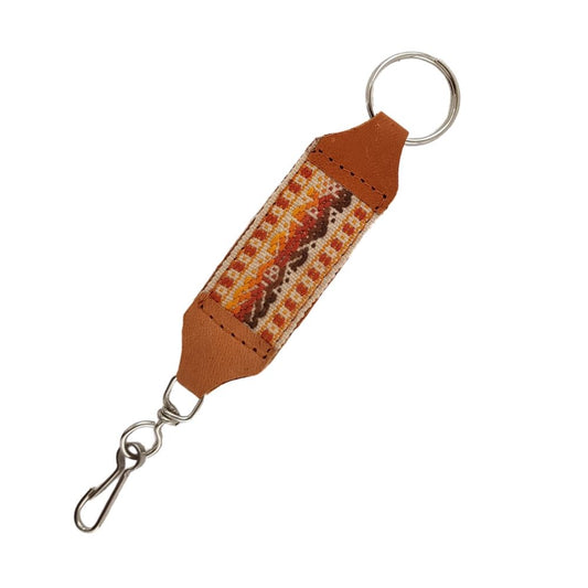 Llavero de piel con textil decorado con motivos Oaxaqueños
