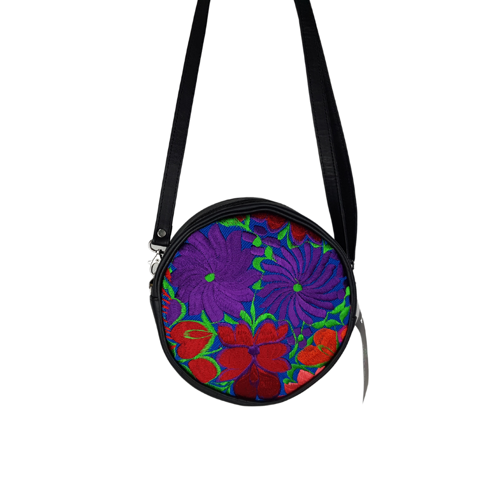 Bolsa redonda de piel con textil artesanal