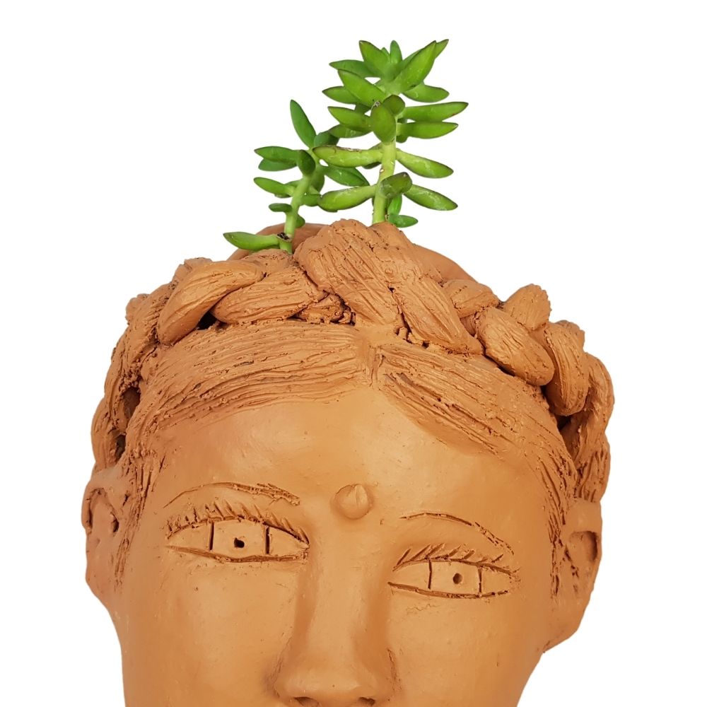 Maceta Teresita, rostro de mujer con trenza tamaño mediano