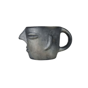 Taza rostro zapoteca de barro negro