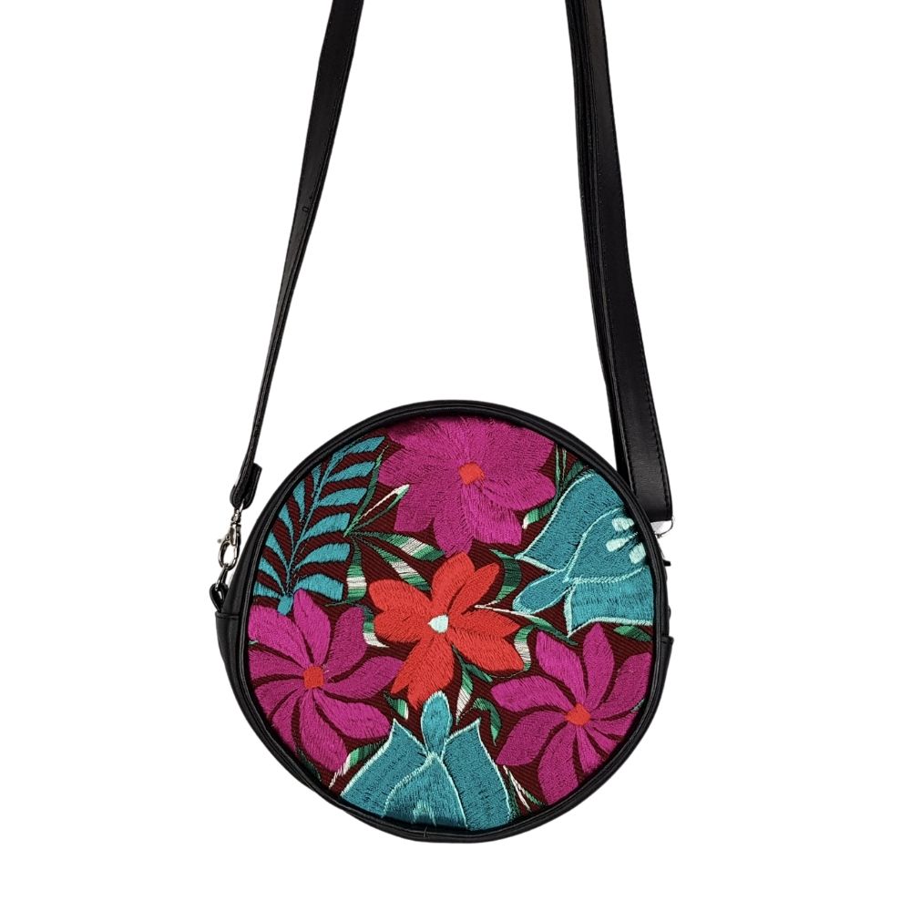 Bolsa redonda de piel con textil artesanal