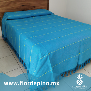 Colcha individual de algodón hecha en telar de pedal en Oaxaca